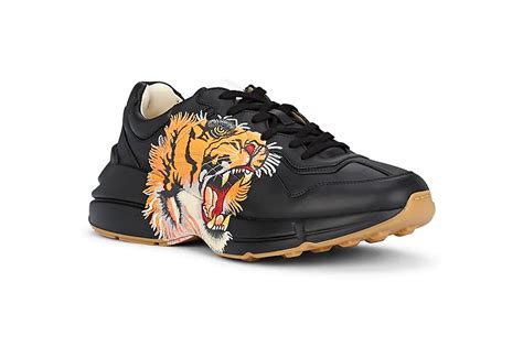 gucci rhyton tiger print sneakers.